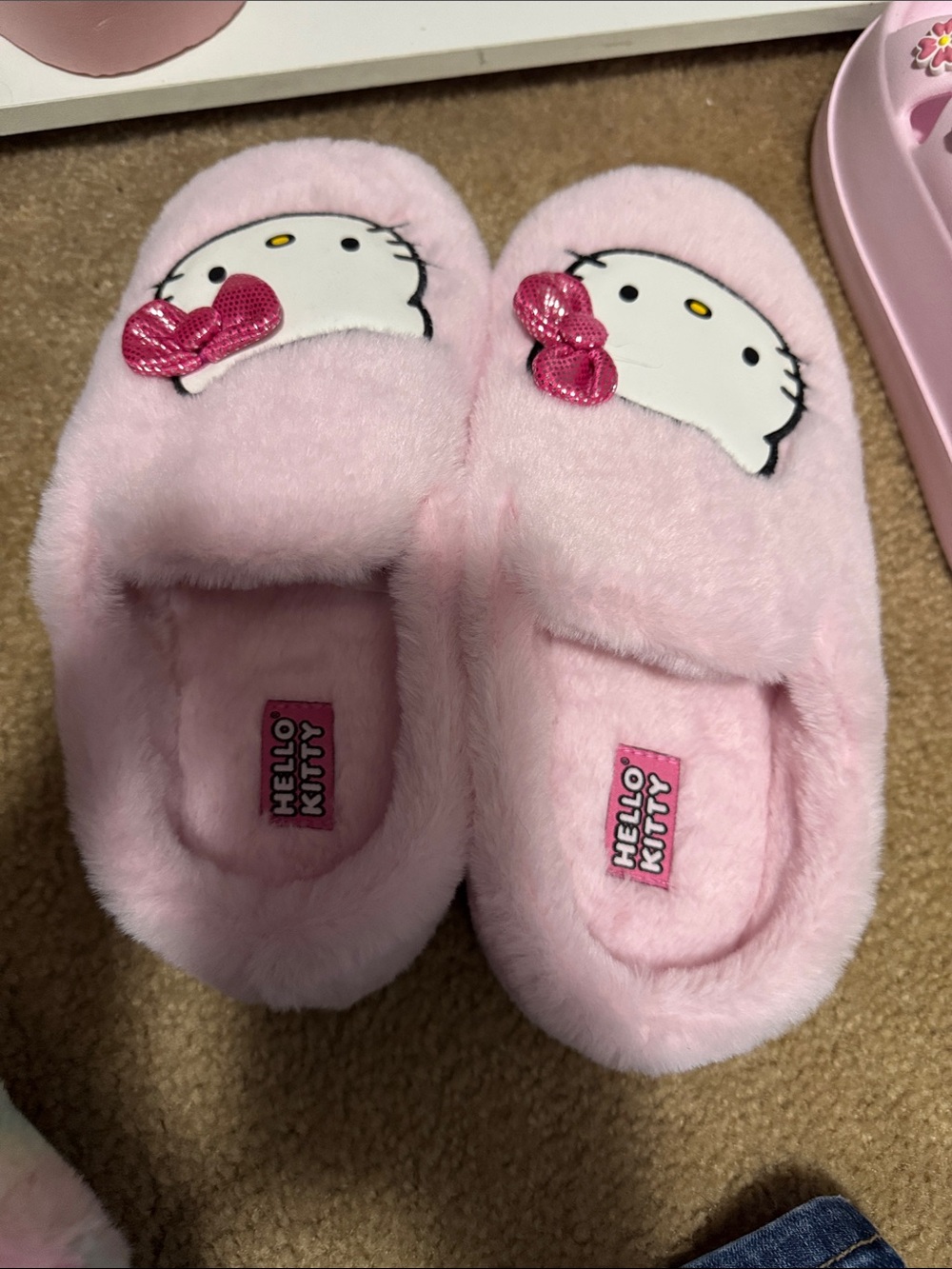 Hello Kitty Pink Plush Women’s Slippers with Shiny Bow Accent